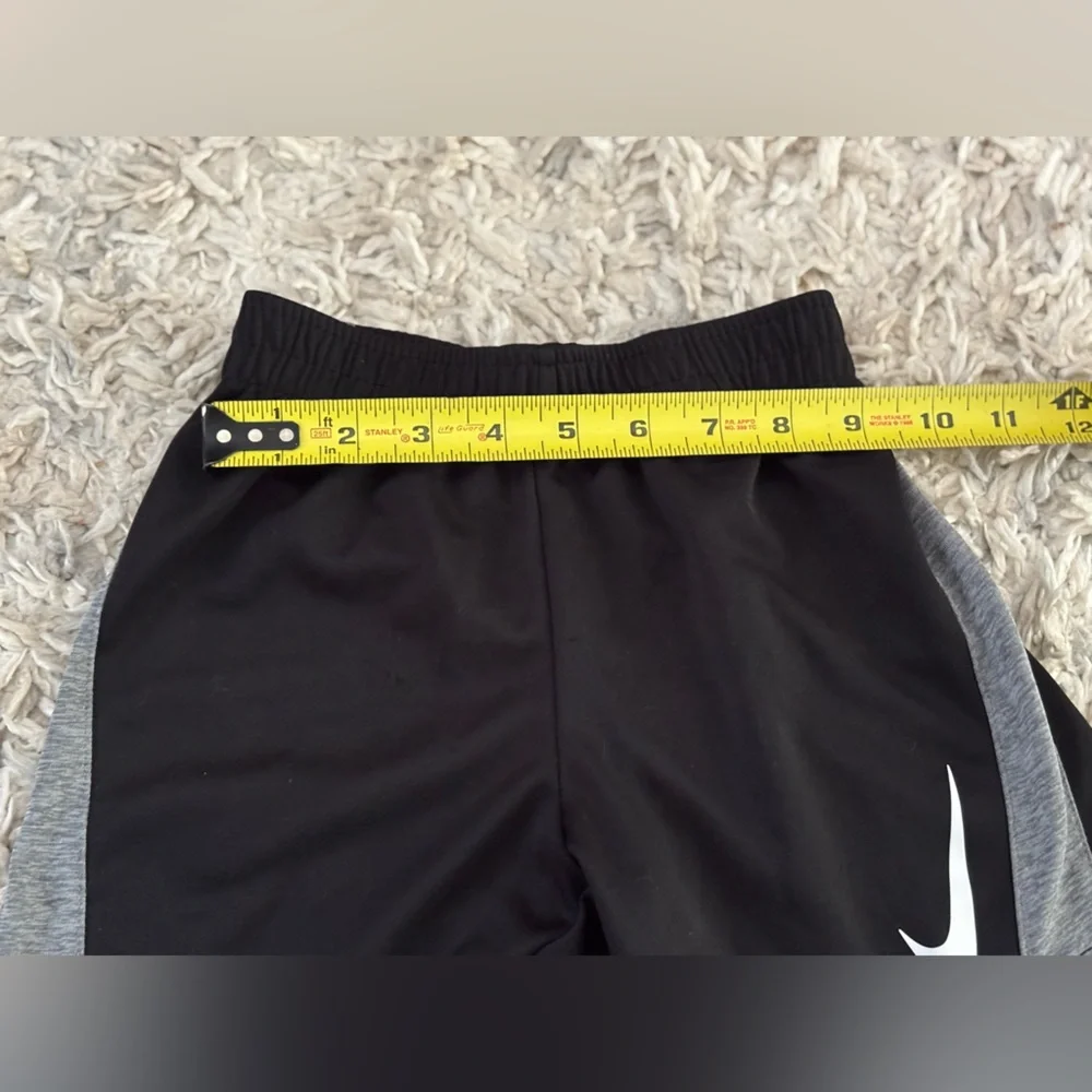 Nike Black and Gray Boys Athletic Shorts with White Swoosh
